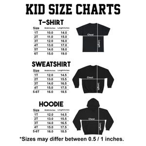 May include: A black and white graphic showing kid size charts for t-shirts, sweatshirts, and hoodies. The charts include size, width, and length measurements in inches. The text "KID SIZE CHARTS" is at the top.