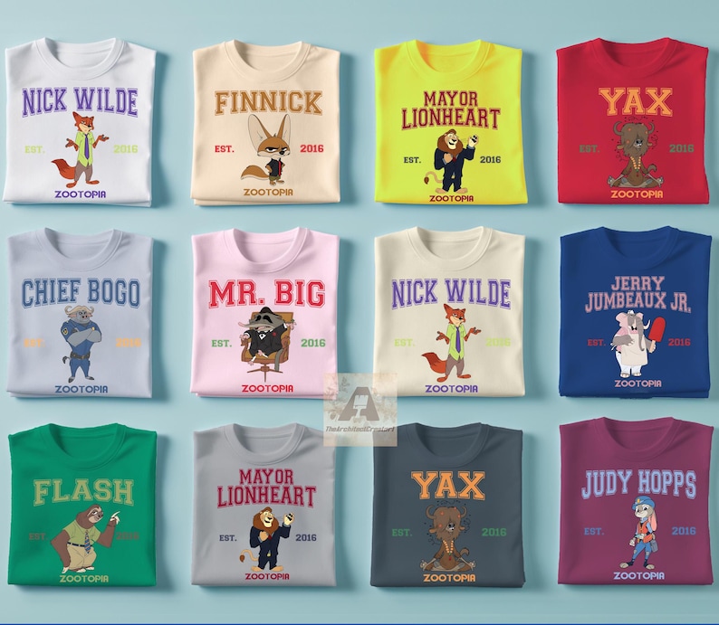 Puede incluir: Una colecci&oacute;n de camisetas con tem&aacute;tica de Zootr&oacute;polis en varios colores, cada una con el nombre y la imagen de un personaje diferente. Las camisetas incluyen personajes como Nick Wilde, Finnick y Mayor Lionheart, con el a&ntilde;o 2016.
