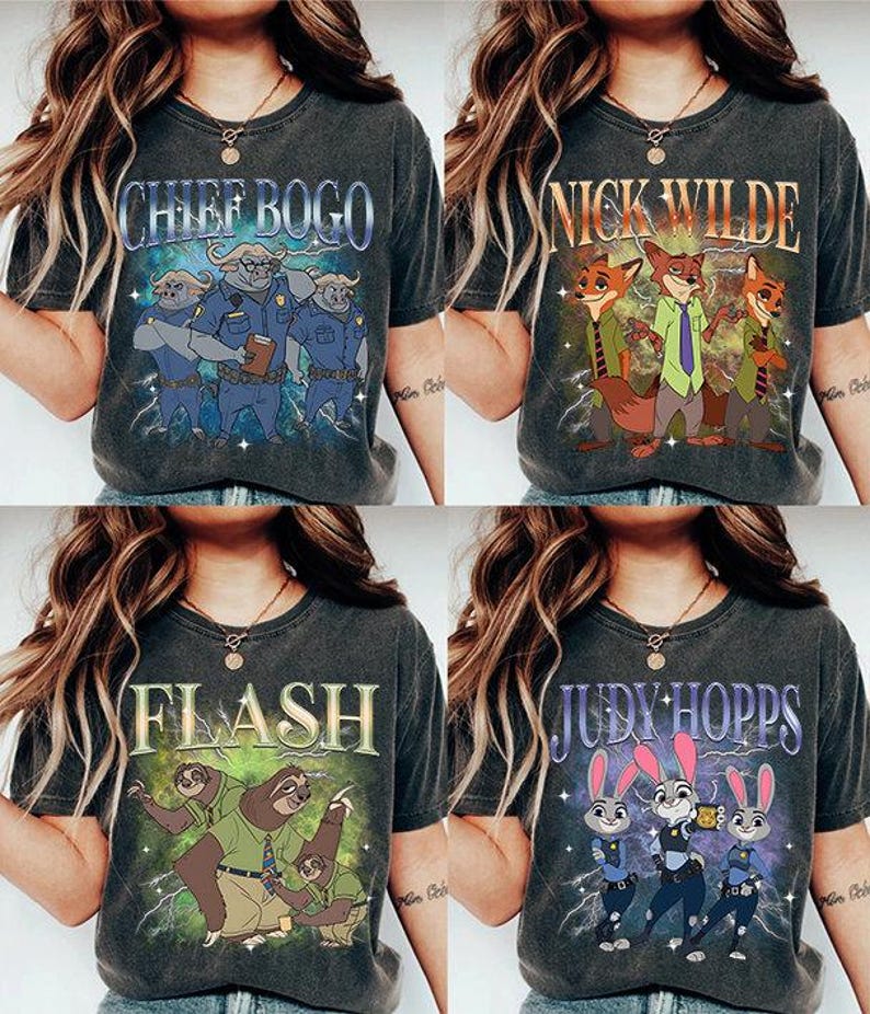 May include: Four dark gray t-shirts featuring characters from the animated movie Zootopia. Each shirt displays a different character or group of characters with their names: Chief Bogo, Nick Wilde, Flash, and Judy Hopps. The designs are in a vintage style.
