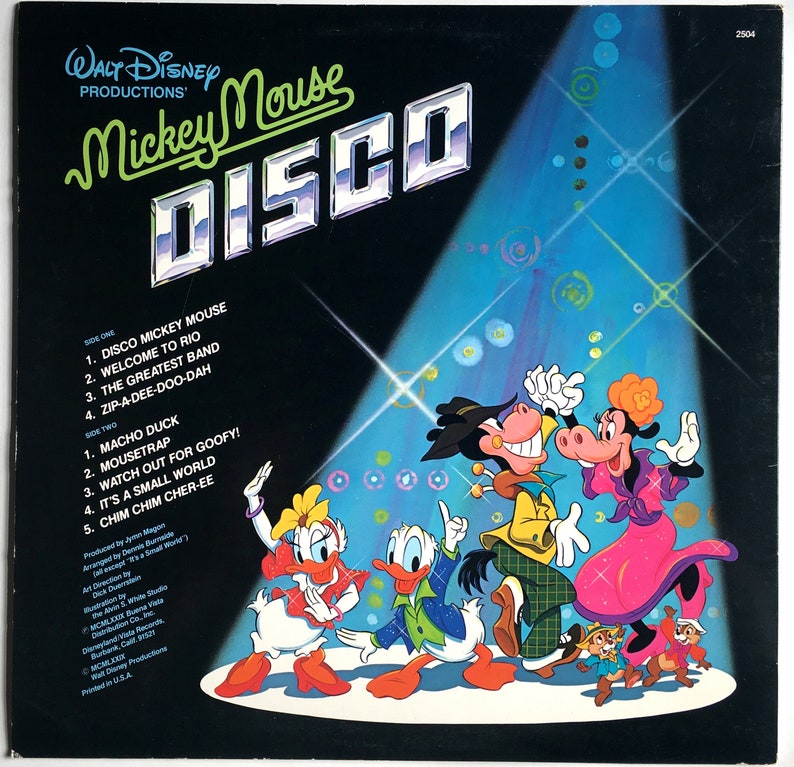 May include: A vintage vinyl record cover featuring Mickey Mouse and friends dancing in a disco setting. The cover is blue and features a spotlight shining on the characters. The title of the record is "Mickey Mouse Disco".