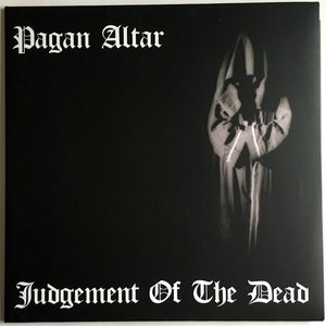 May include: Black and white album cover with the text "Pagan Altar" in white gothic font at the top and "Judgement Of The Dead" in white gothic font at the bottom. A hooded figure is in the center of the cover.