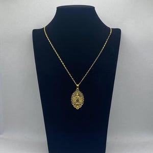 Christian necklace with golden medallion of the Virgin Mary, Catholic Jesus jewelry