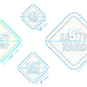 May include: Four diamond-shaped safety stickers with measurements in inches and centimeters. The stickers are white with a light blue border and text that reads "SAFETY THIRD". One sticker is labeled "FLUORESCENT".
