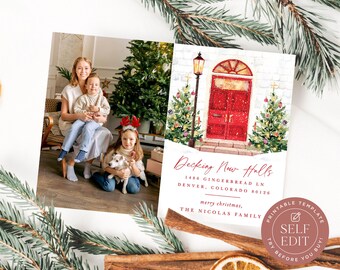 May include: A holiday greeting card template featuring a photo of a family with a dog next to a watercolor illustration of a red front door, Christmas trees, and a street lamp. Text reads: Decking New Halls, 1486 GINGERBREAD LN, DENVER, COLORADO 80126.