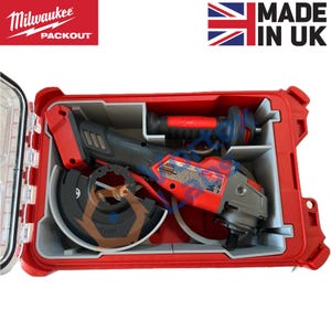 May include: A red Milwaukee Packout case containing a red and black angle grinder with a silver blade guard. The case has grey compartments and a clear lid. The words "Milwaukee" and "PACKOUT" are visible. Made in UK.