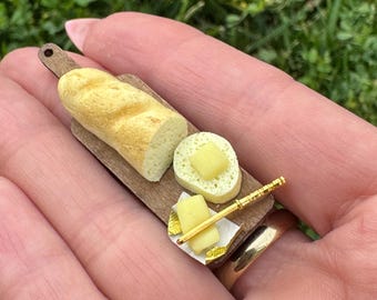 Dollhouse miniature sourdough baguette with butter