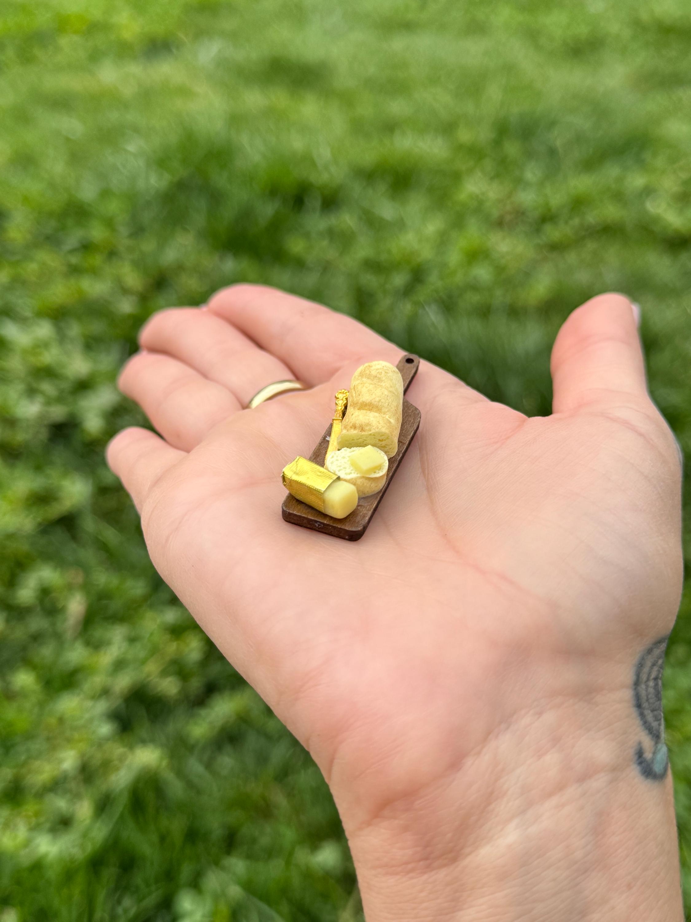 Dollhouse miniature sourdough baguette with butter