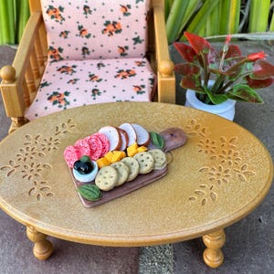 Dollhouse miniature charcuterie board with olives