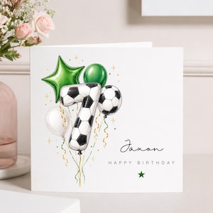 May include: A white square birthday greeting card featuring a large number seven shaped like a football, surrounded by green star and round balloons, a white balloon, and gold ribbons. The text reads Jaxon and HAPPY BIRTHDAY with a green star.