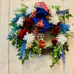 Celebrate love of Country with this Patriotic, brightly colored red, White, and Blue Floral Wreath burlap silk Ribbon