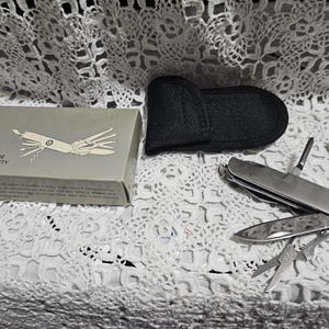 Stainless Steel Multi-Tool Pocket Knife – 10-in-1 Folding Tool with Case & Box