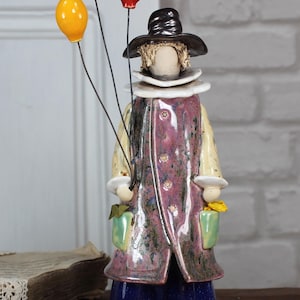 Handmade Ceramic Figurine with Balloons - Whimsical Clay Character - Colorful Decorative Sculpture - Unique Art Gift