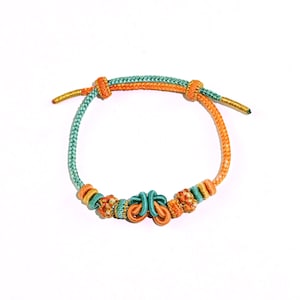 Taoway Handmade Bracelet – Golden Butterfly Knot & Peach Blossom Loops for Love, Harmony and Blessings