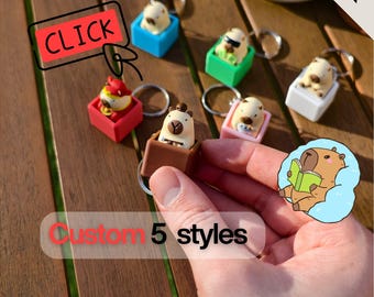 Grazioso portachiavi antistress in resina a forma di capibara con tasto intercambiabile – Interruttore Fidget a cubo con dettagli in resina – Regalo perfetto