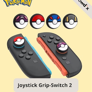 Könnte beinhalten: Schwarze und graue Switch-Controller mit farbenfrohen Joystick-Griffen zum Thema Pokémon. Das Bild enthält das Pokémon-Logo und den Text "Joystick Grip-Switch 2".