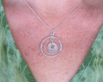 Small Sun In Circle on Silver Chain