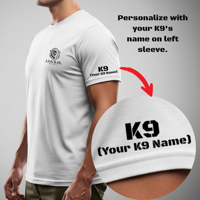 May include: White t-shirt with a black lion logo and the text "L.E.O. & CO." on the chest. The left sleeve features "K9" above "(Your K9 Name)". The shirt is designed to be personalized with a K9's name.
