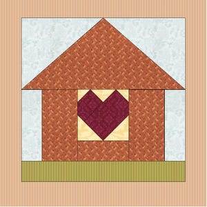 May include: A patchwork quilt block featuring a house design with a heart-shaped window. The roof and walls are a patterned orange fabric, the window is a burgundy heart on a yellow background, and the sky is a light blue floral print.