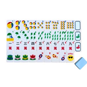 May include: A complete set of white Mahjong tiles with various colorful symbols and numbers. The tiles feature images of circles, bamboo, and characters. A blue tile is also included.