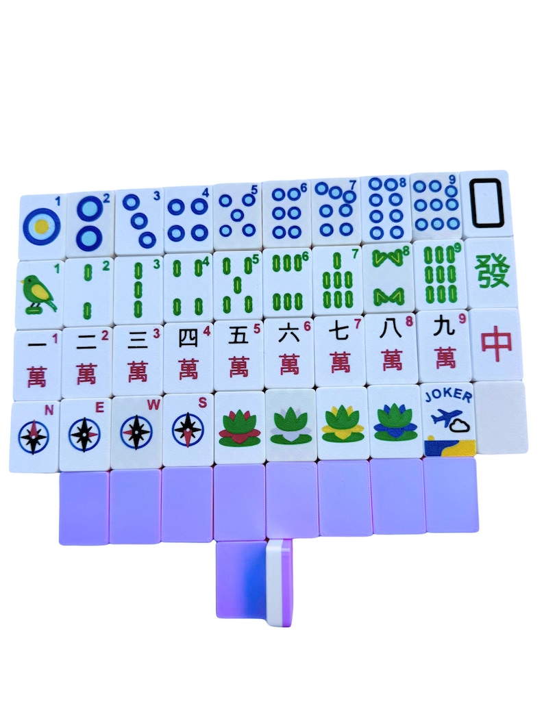 May include: A set of Mahjong tiles, featuring white tiles with blue, green, and red markings. The tiles display numbers, symbols, and Chinese characters. A few purple tiles are also visible.
