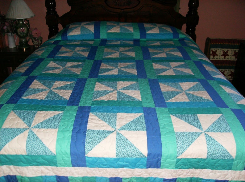 Pinwheel Pattern Quilt Queen Size Bed Teal Image 0