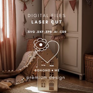 Peut inclure: Téléchargement de fichier numérique pour la découpe au laser d'une maison en bois avec un motif de cœur et d'œil. Le texte "BOHOHO.ME premium design" est sur la maison. Les formats de fichiers inclus sont .SVG, .DXF, .EPS, .AI et .CDR.