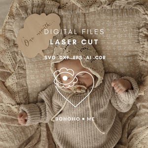 May include: A sleeping baby wearing a knitted bonnet and sweater, with a pacifier. The image includes text that reads "DIGITAL FILES LASER CUT" and "One month..." on a wooden cloud-shaped sign. The design also features a heart and cloud graphic.