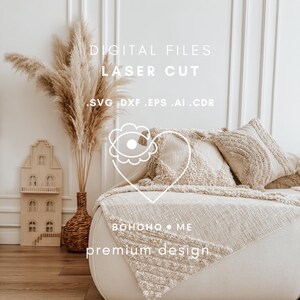 May include: A digital file for laser cutting a boho-style design with a heart and eye motif. The design is in white and is on a beige background. The text "BOHOHO ME premium design" is also included in the image.