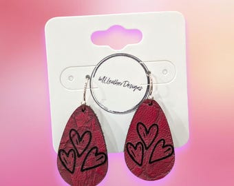 Laser engraved small leather triple heart earrings