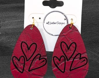 Laser engraved leather triple heart earrings