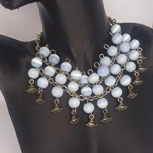 Vintage Style Blue Beaded Statement Necklace with Antique Brass Charms, Layered Chunky Boho Jewelry for Women, Handmade Vintage Necklace