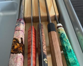 Knife holding block for drawers