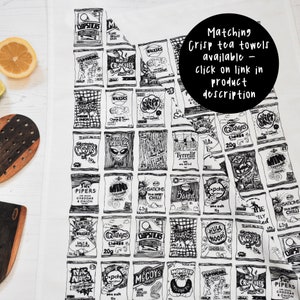 May include: A white tea towel with a black and white illustration of various popular British crisp brands. The text "Matching Crisp tea towels available - click on link in product description" is printed in black on a white circle in the upper right corner of the towel.