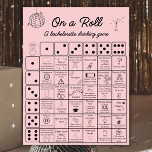 以下が含まれることがあります： 「On a Roll」と題されたピンク色の独身女性向け飲酒ゲーム。ゲームにはサイコロ、飲酒のプロンプト、「真実か挑戦か」、「キス、結婚、殺す」、そして「飲み干す！」などのフレーズが含まれています。下部にはディスコボールがあります。