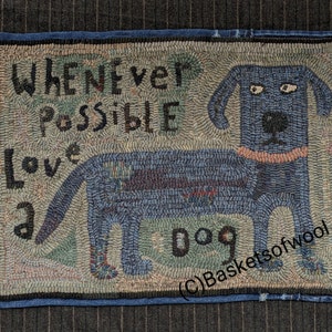 May include: Hand-hooked rug featuring a blue dog with a pink collar. The rug has the text "WHENEVER POSSIBLE LOVE A DOG" in black letters. The rug is bordered with blue fabric and has a gray background.