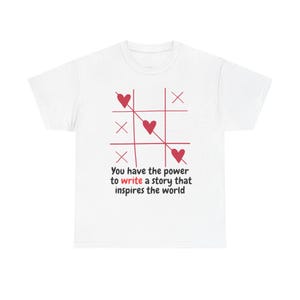 Inspirierende Botschaft Unisex-T-Shirt aus schwerer Baumwolle - "Sie haben die Macht, eine Geschichte zu schreiben, die die Welt inspiriert"