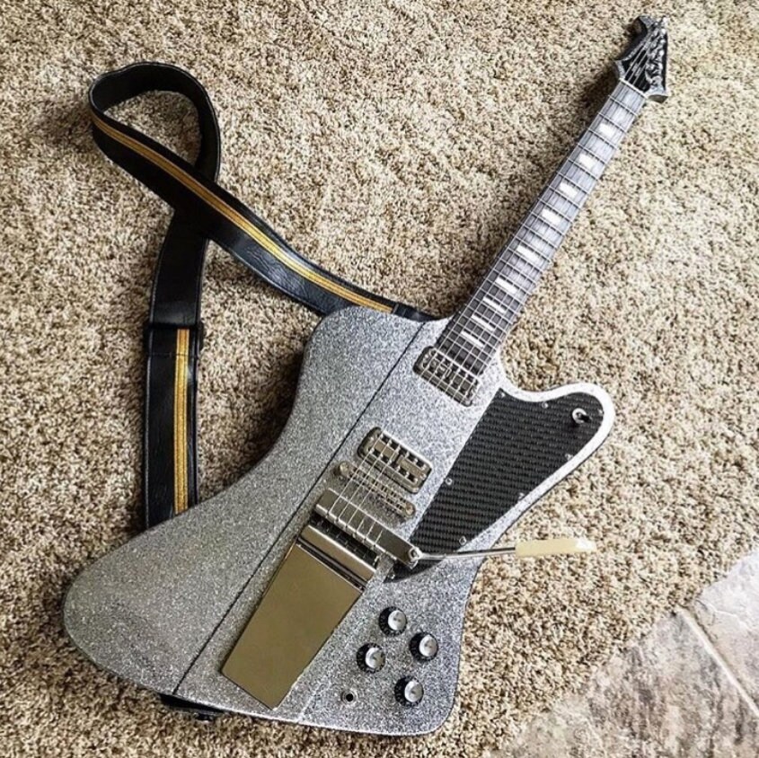 black and gold guitar strap