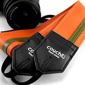 The &quot;John Cale&quot; Orange w/ Olive stripe Racer X Camera Strap