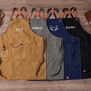 May include: A set of three ceramic mugs with a speckled, matte finish. The mugs are in shades of cream, light gray, and dark gray. Each mug has a simple, minimalist design, perfect for coffee or tea.