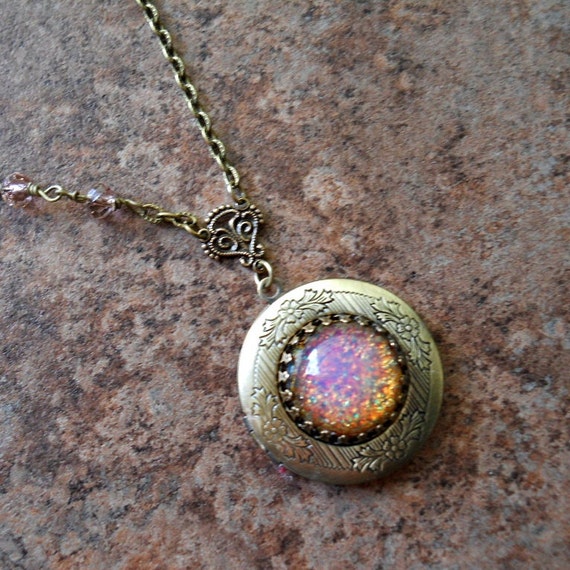 Items similar to Fire Opal Brass Locket by Enchanted Lockets on Etsy