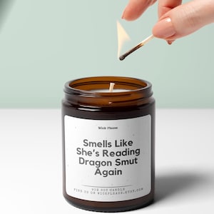 Funny Candle Smells Like She&#39;s Reading Dragon Smut Again Fantasy Book Lover Gift Smutty Candle Gift Bookish Merch Gift For Her