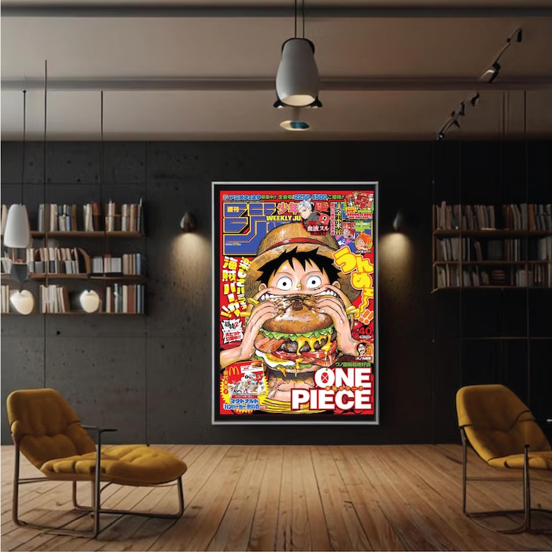 May include: A framed poster featuring a colorful illustration of a character from the anime series One Piece. The character is shown biting into a large hamburger. The poster has the words "ONE PIECE" in large letters.