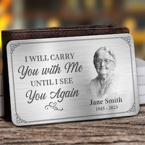 May include: A silver metal wallet card with the text "I WILL CARRY You with Me UNTIL I SEE You Again" and a photo of a woman. The card also includes the name "Jane Smith" and the years "1945 - 2023".
