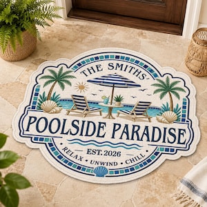 May include: A custom-shaped doormat featuring a blue and white poolside scene with two lounge chairs, a striped umbrella, palm trees, and seashells. The text reads THE SMITHS, POOLSIDE PARADISE, EST. 2026, RELAX, UNWIND, CHILL in dark blue lettering.