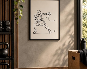 May include: A framed wall art print featuring a black continuous line drawing of a boxer in a fighting stance on a cream background. The artwork depicts a figure wearing boxing gloves and shorts, captured in a single fluid stroke.