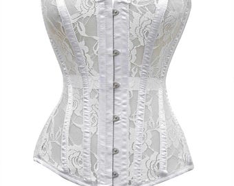 May include: A white corset with a floral lace overlay. The corset features vertical boning, a satin trim, and a series of silver-colored clasps down the front. The garment is designed to cinch the waist and create an hourglass figure.