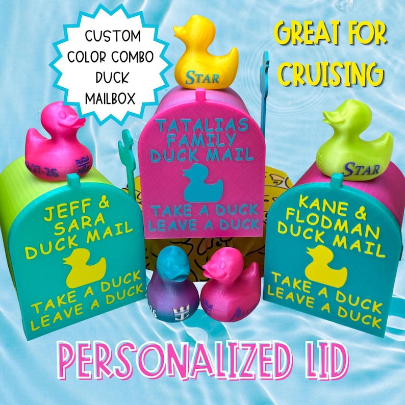 May include: Three 3D-printed plastic mailboxes in pink and teal, each topped with a rubber duck. The mailboxes feature yellow text reading JEFF & SARA DUCK MAIL, TATALIAS FAMILY DUCK MAIL, and KANE & FLODMAN DUCK MAIL, with the phrase TAKE A DUCK LEAVE A DUCK.