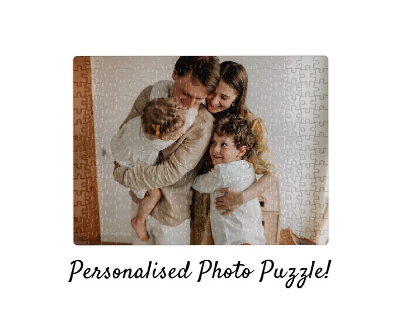 May include: A personalized photo puzzle featuring a family of five. The puzzle shows a family embracing each other. The text "Personalised Photo Puzzle!" is written in a cursive font at the bottom of the image.