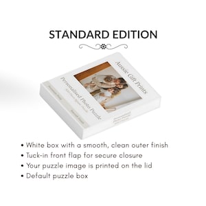 May include: A white puzzle box with a smooth finish, featuring a family photo on the lid. The box has a tuck-in front flap for secure closure. The text "Personalised Photo Puzzle" and "Aussie Gift Prints" are visible.