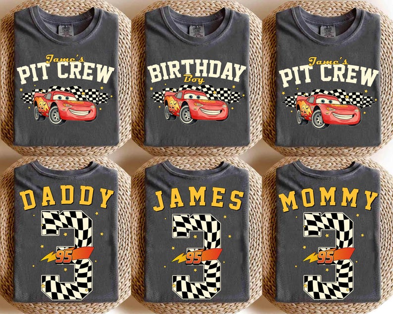 May include: Six gray t-shirts with various designs. The top row features Lightning McQueen from the movie Cars, with text that reads "James's Pit Crew" and "Birthday Boy". The bottom row has "Daddy", "James", and "Mommy" with a number 3 and the number 95.